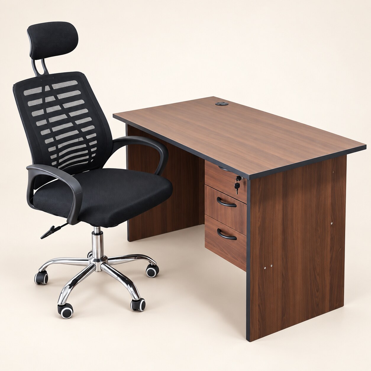 Walnut office desk with two drawers and black mesh chair on a light studio background