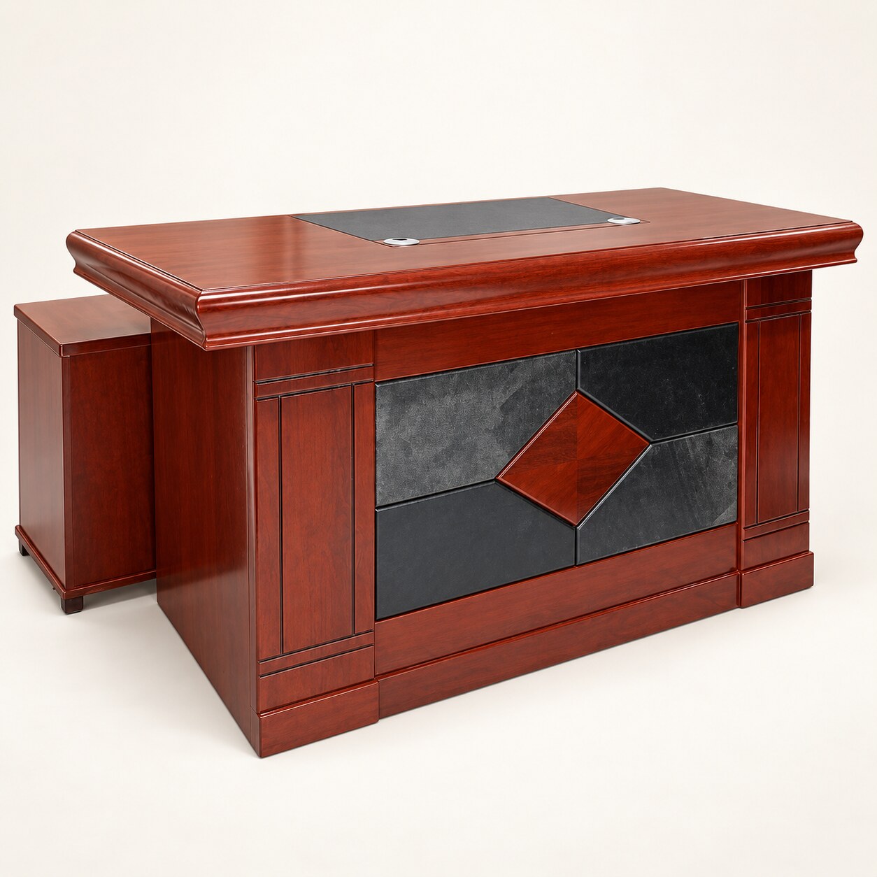 Traditional mahogany executive desk with dark decorative front and side return on a light background