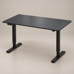 Black height-adjustable electric standing desk with a control panel on a warm neutral studio background