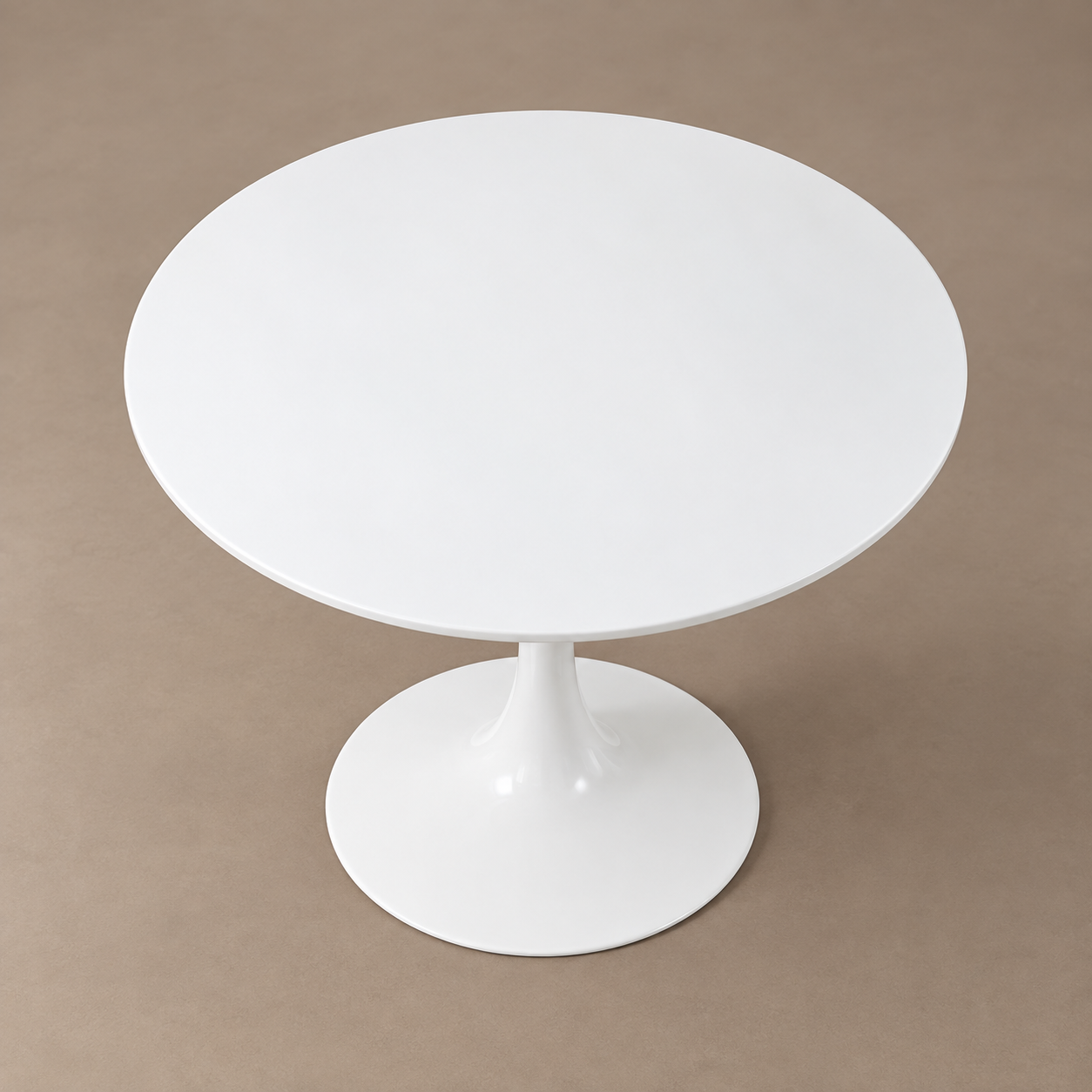 White round dining table with central pedestal base